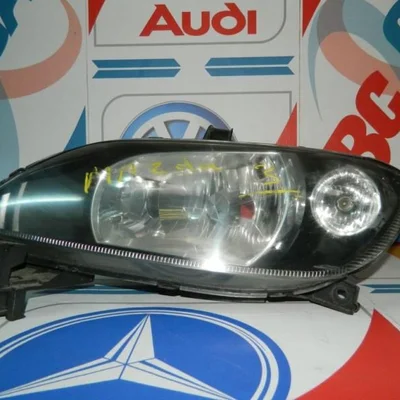 Far stanga MAZDA 121 II 1990-1997 3M71-13W030-AF, vedere frontata