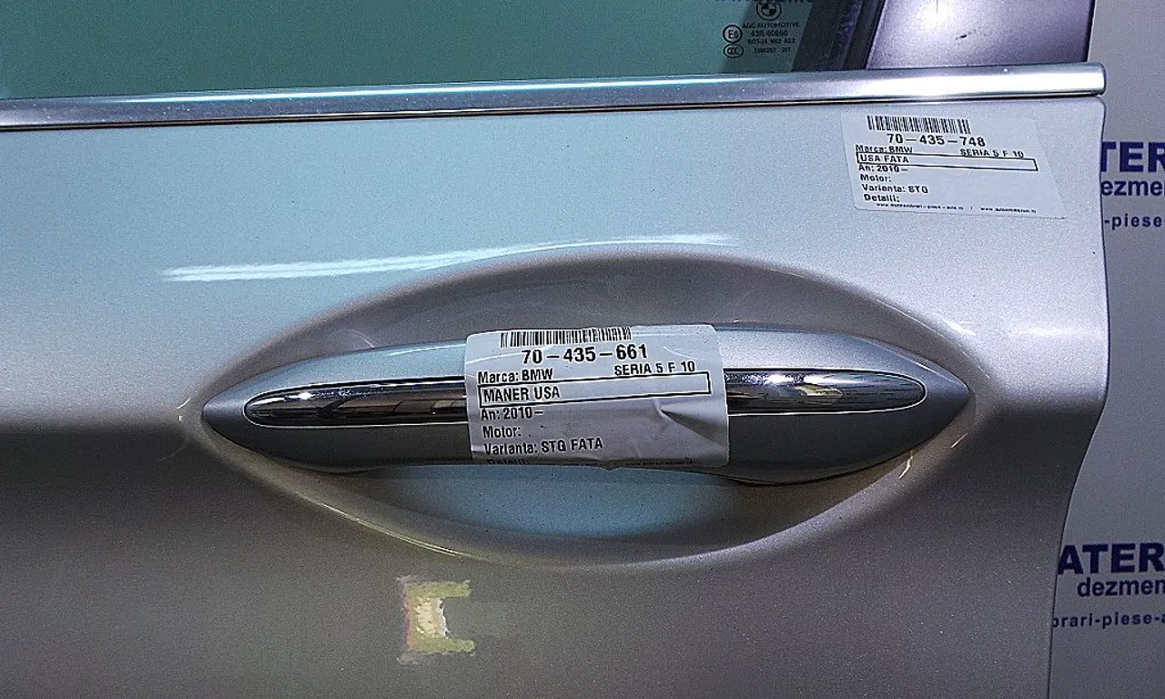 MANER USA FATA STANGA BMW 5 2009-2017