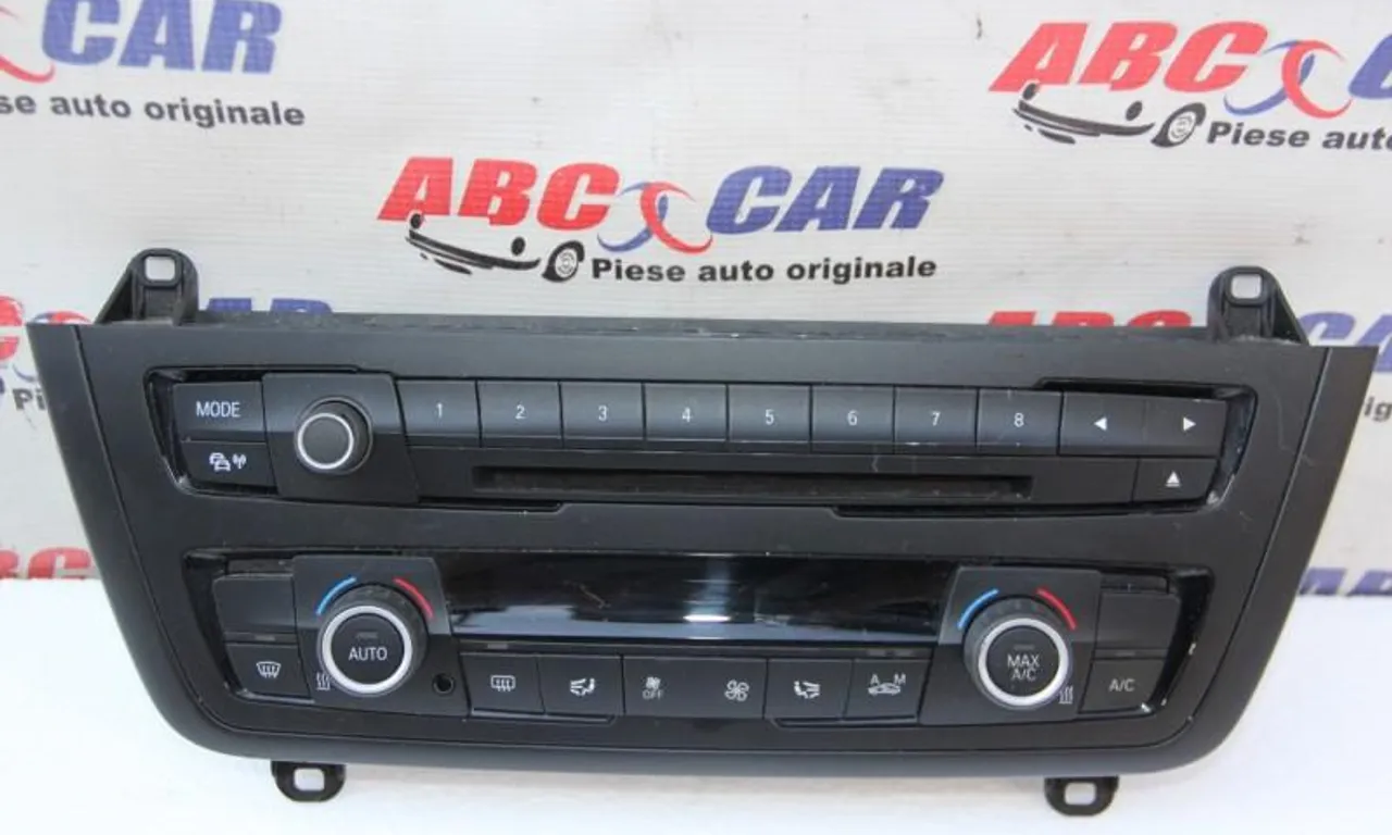 Panou comenzi clima si radio BMW X5 2006-2013
