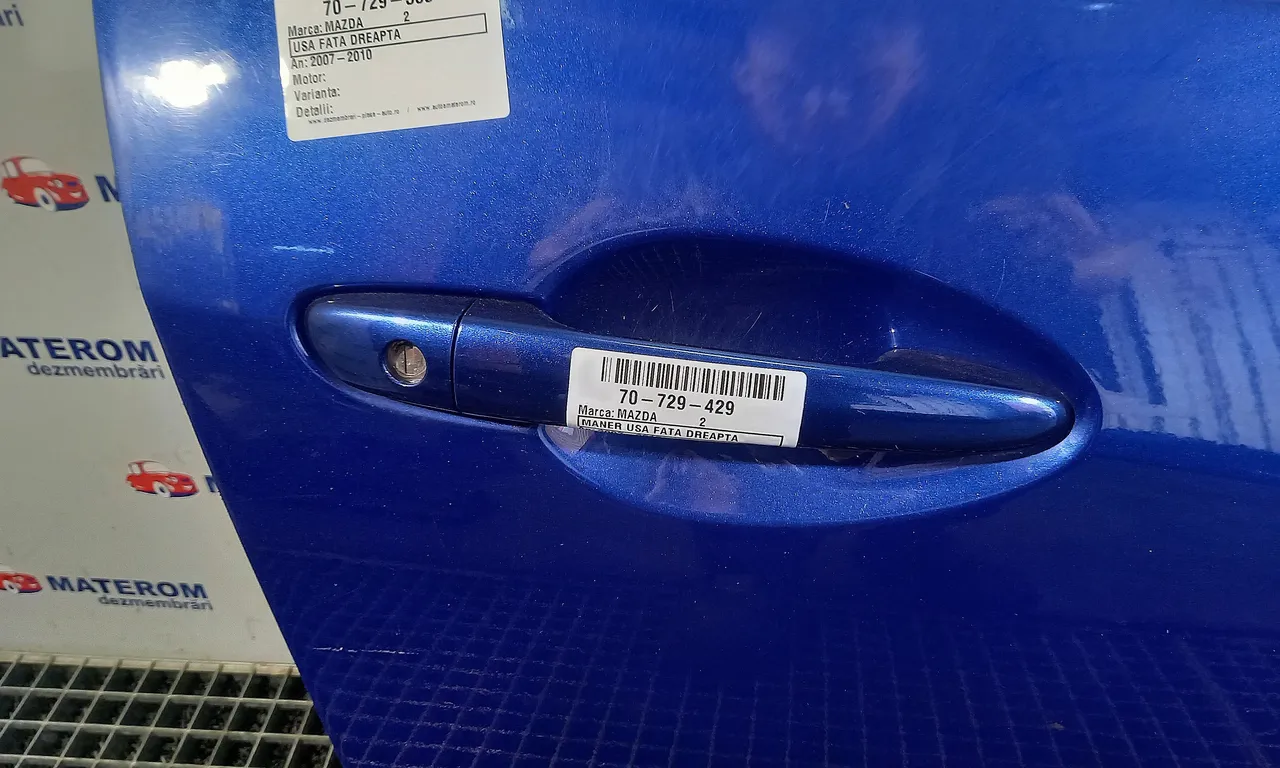 MANER USA FATA DREAPTA MAZDA 2 2007-2015