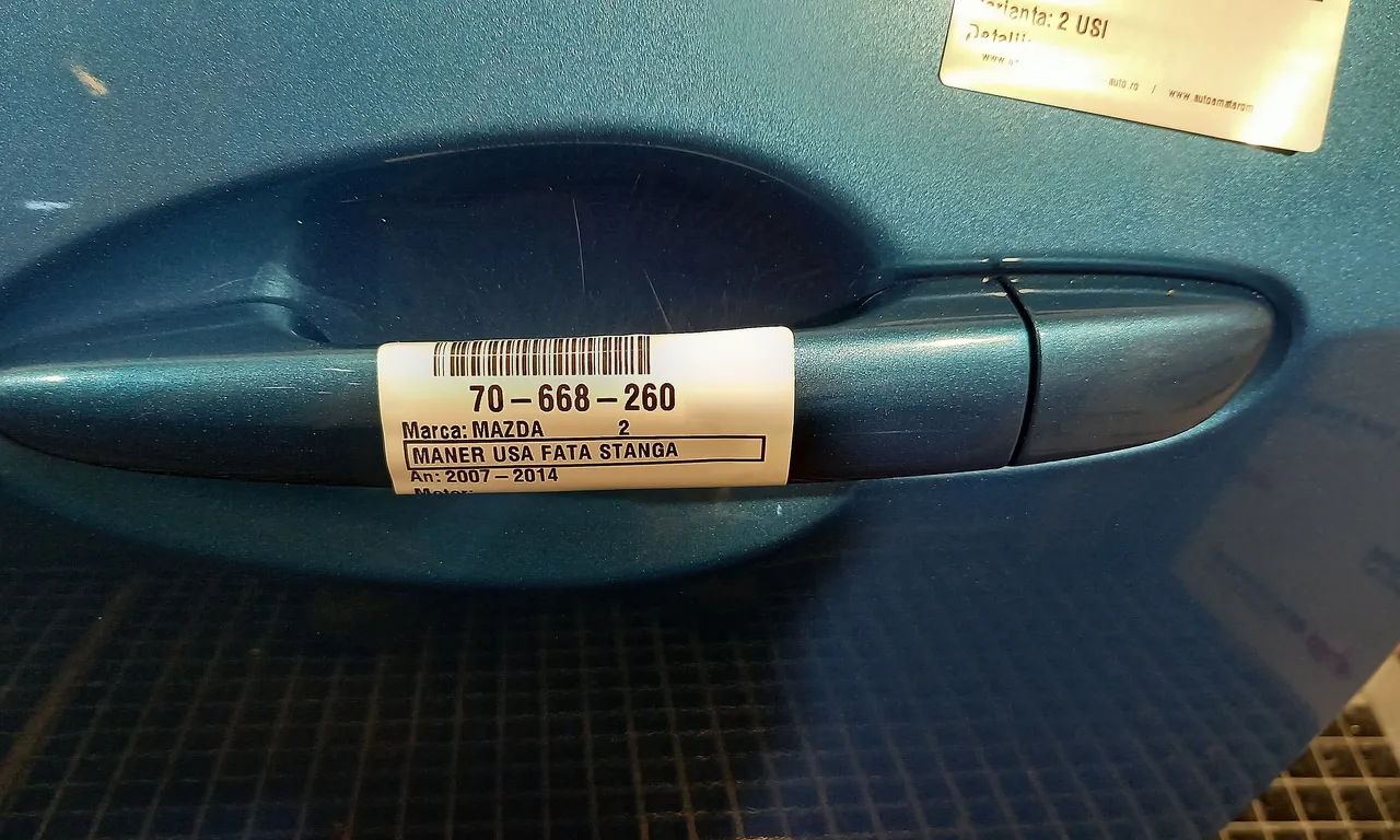 MANER USA FATA STANGA MAZDA 2 2007-2015