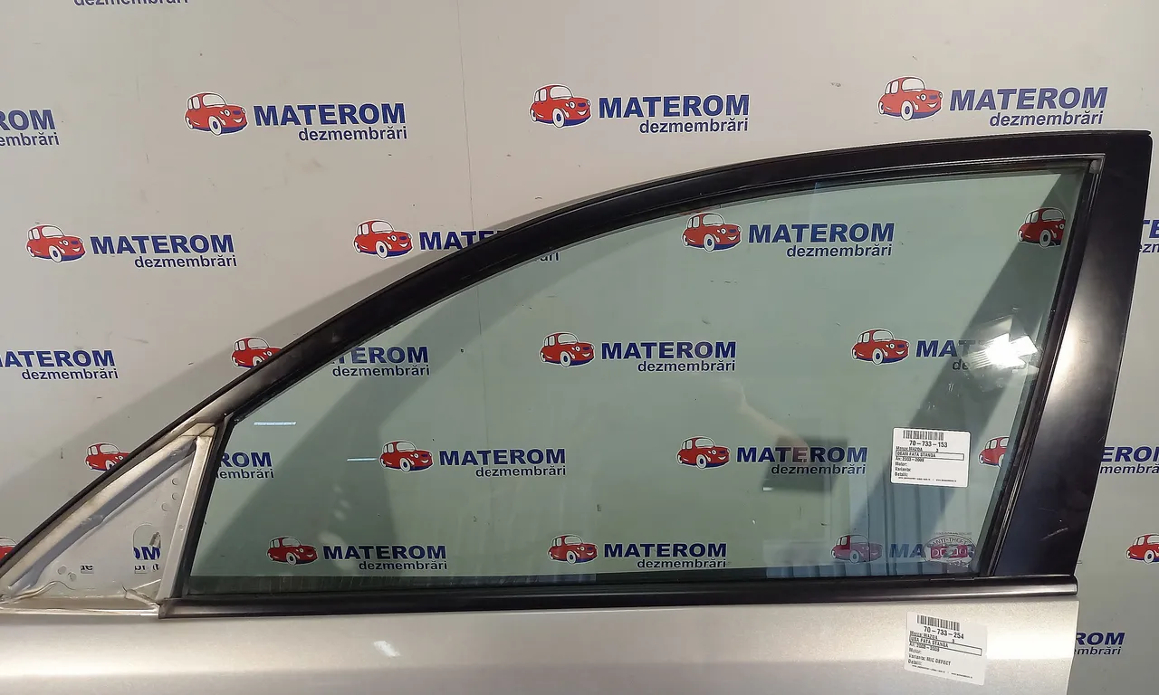 GEAM FATA STANGA MAZDA 3 2003-2009