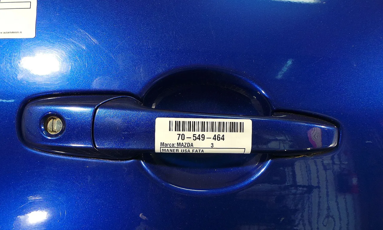 MANER USA FATA DREAPTA MAZDA 3 2003-2009
