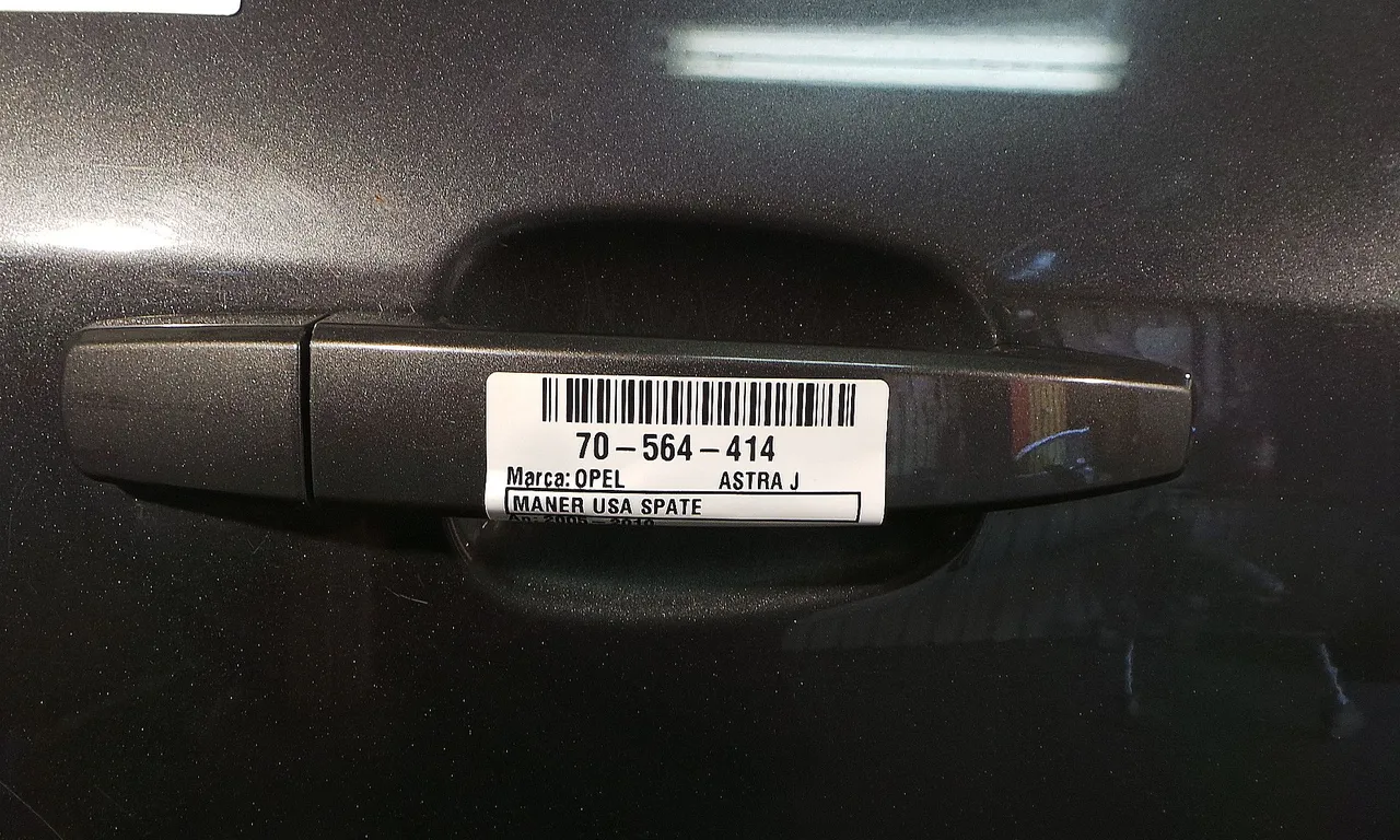 MANER USA SPATE DREAPTA OPEL ASTRA J 2009-2016