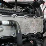 Intercooler cu galerie admisie VOLKSWAGEN POLO V 2009-2017 04E145749B, vedere frontata