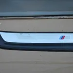 Ornament m-pachet prag stanga fata BMW X1 2009-2015 7318567-01, vedere laterala